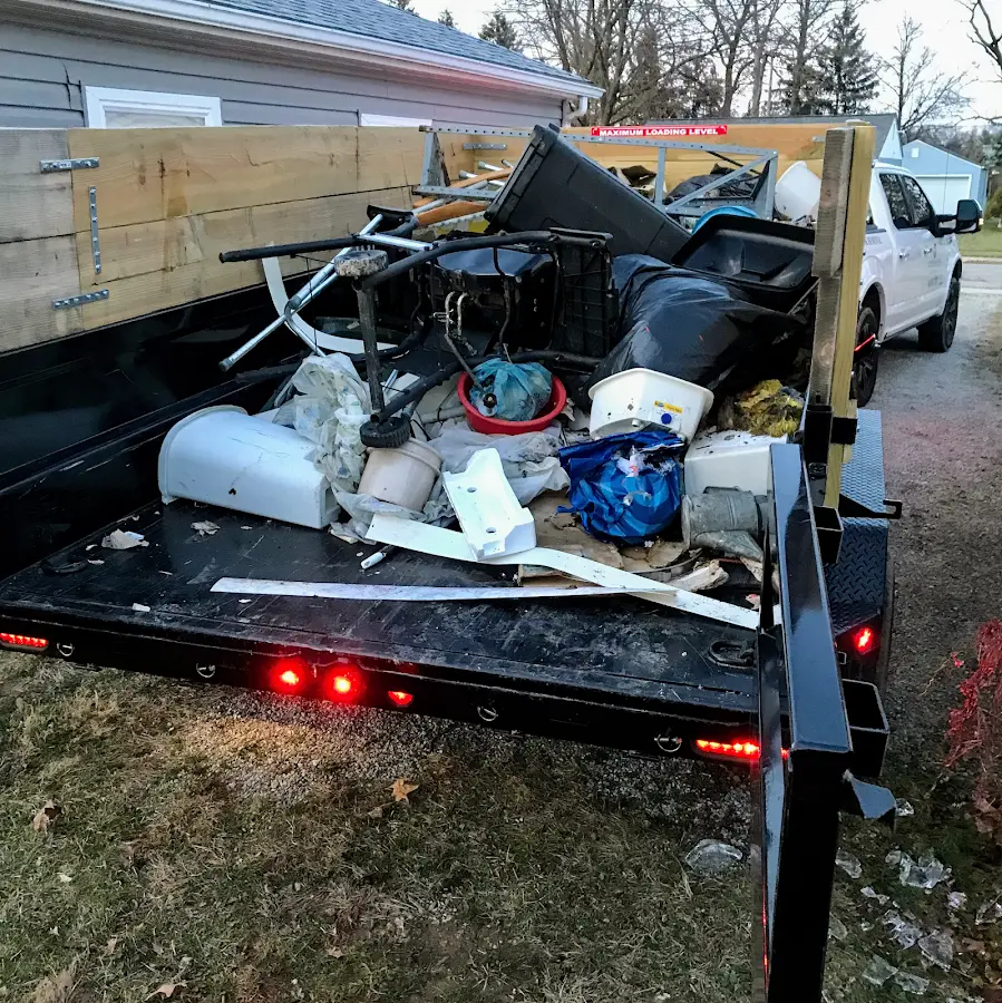 Roll-off dumpster delivered to a residential driveway in Osprey