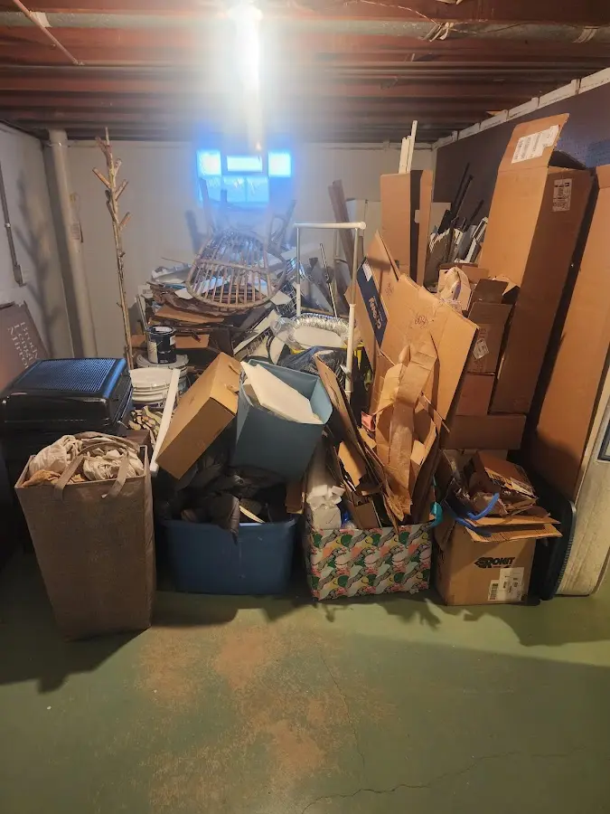 Roll-off dumpster container at job site for 2 Yard Dumpster Rental in Osprey